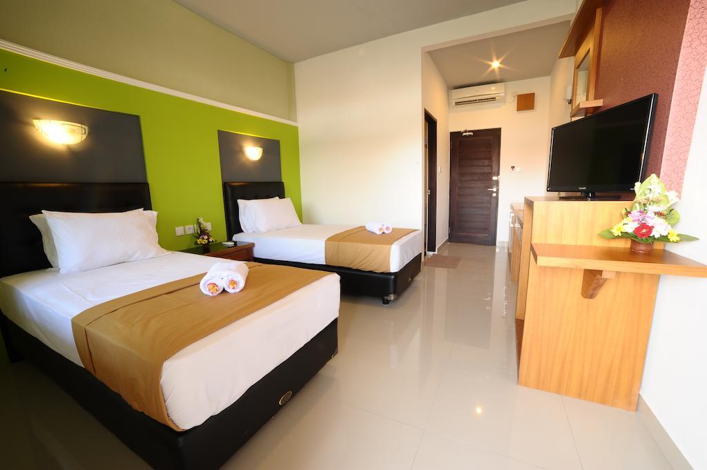 Sandat Hotel Kuta Кута Номер фото